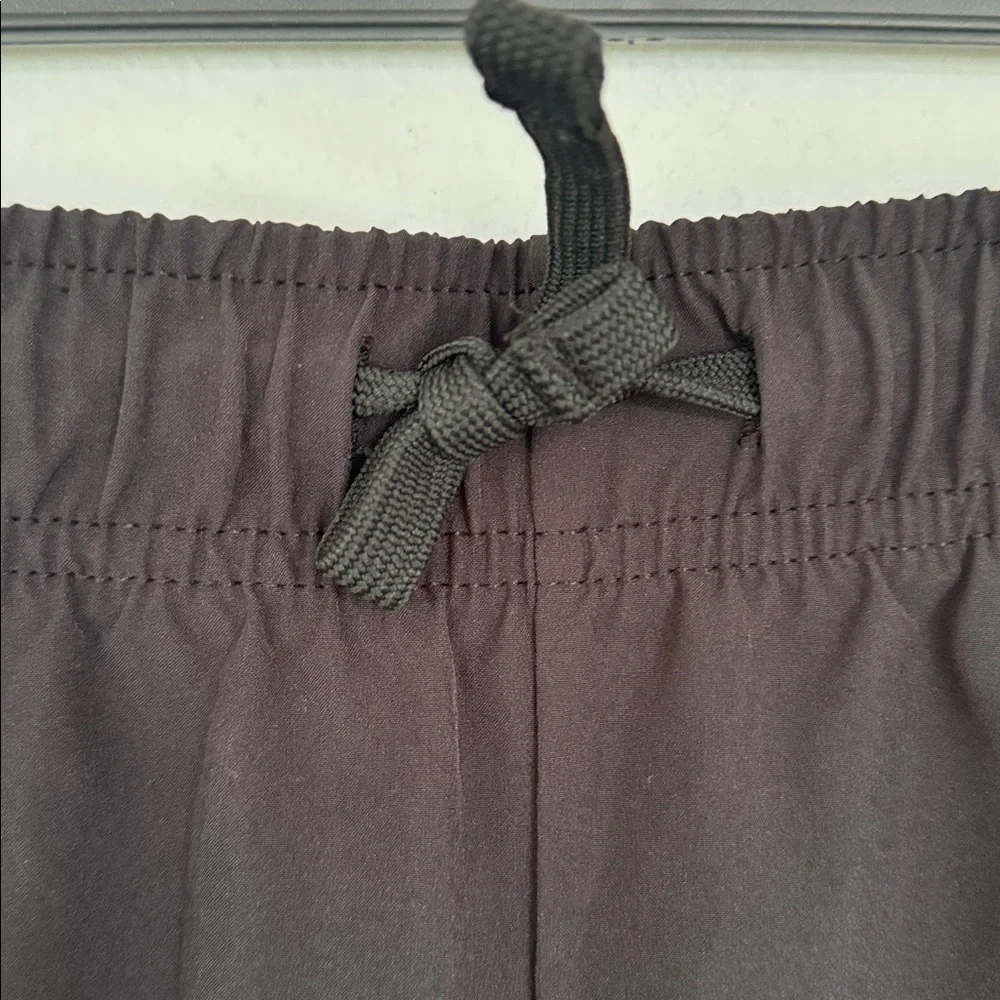 Athletic Works DriWorks girl’s black tapered ankle windbreaker joggers size XL